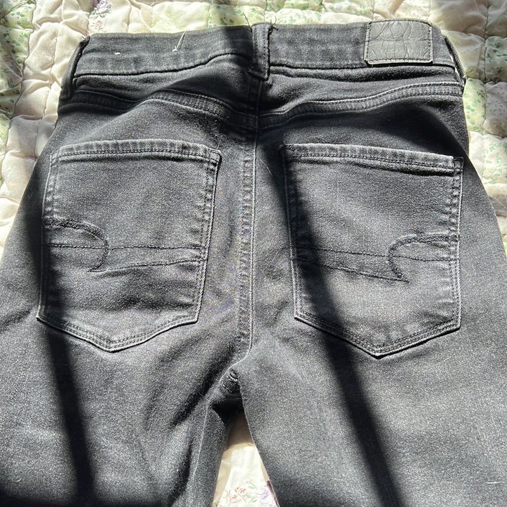 AE 2 Black Skinny Ripped Jeans
